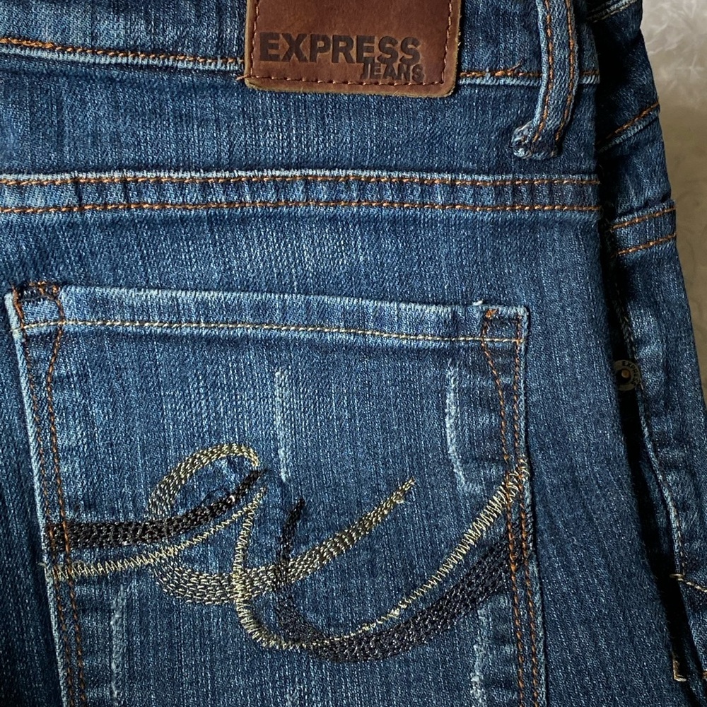Y2K Express Jeans Medium Wash Distressed Blue Jeans “ Eva” wide leg bell bottoms